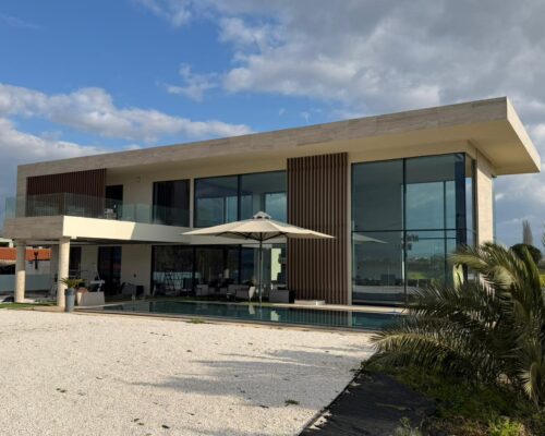 Minimal aluminium frames and Alumil Smartia M7 curtain wall & S650 Eclipse Supreme minimal sliding in contemporary private residence