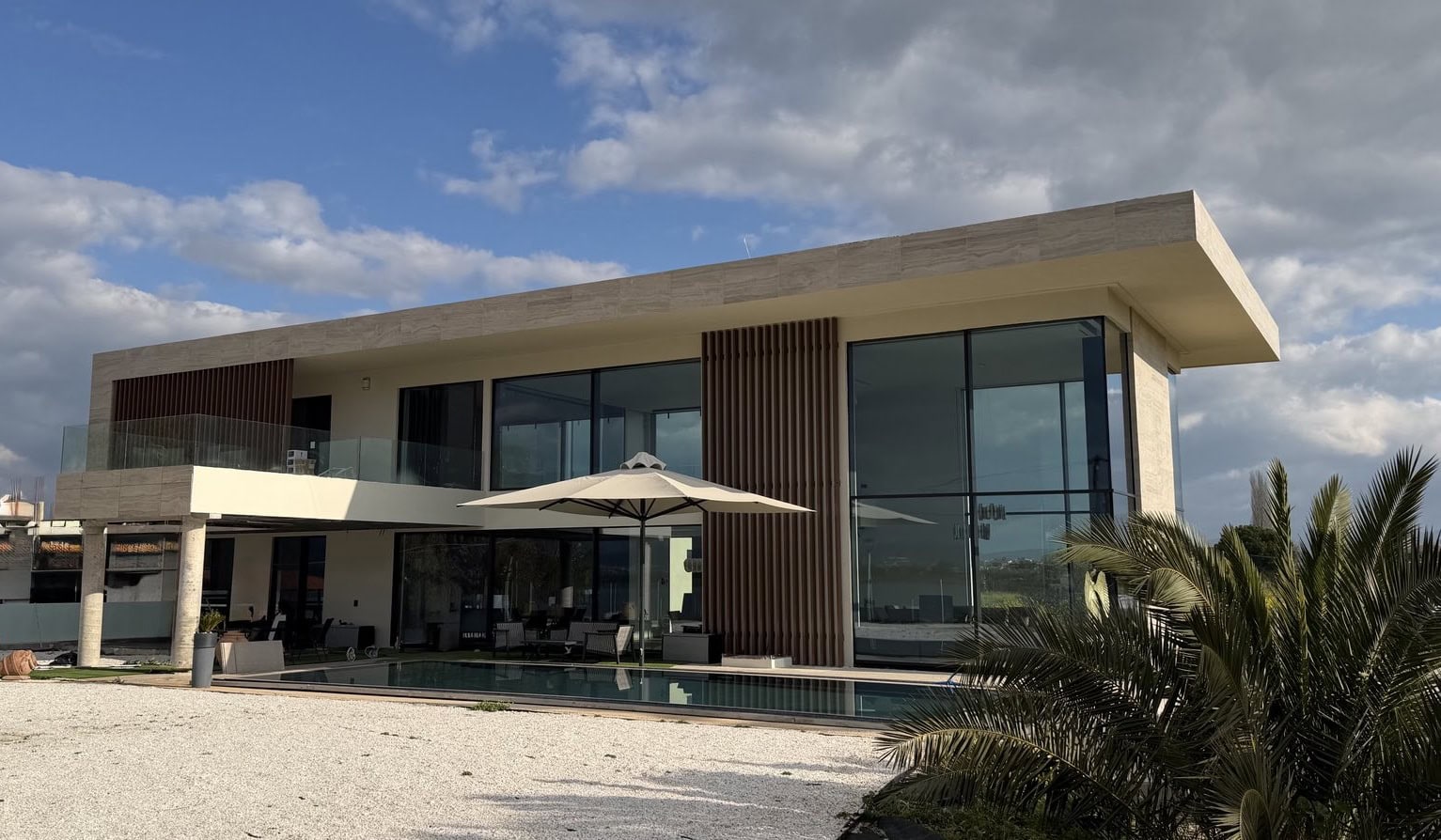 Minimal aluminium frames and Alumil Smartia M7 curtain wall & S650 Eclipse Supreme minimal sliding in contemporary private residence